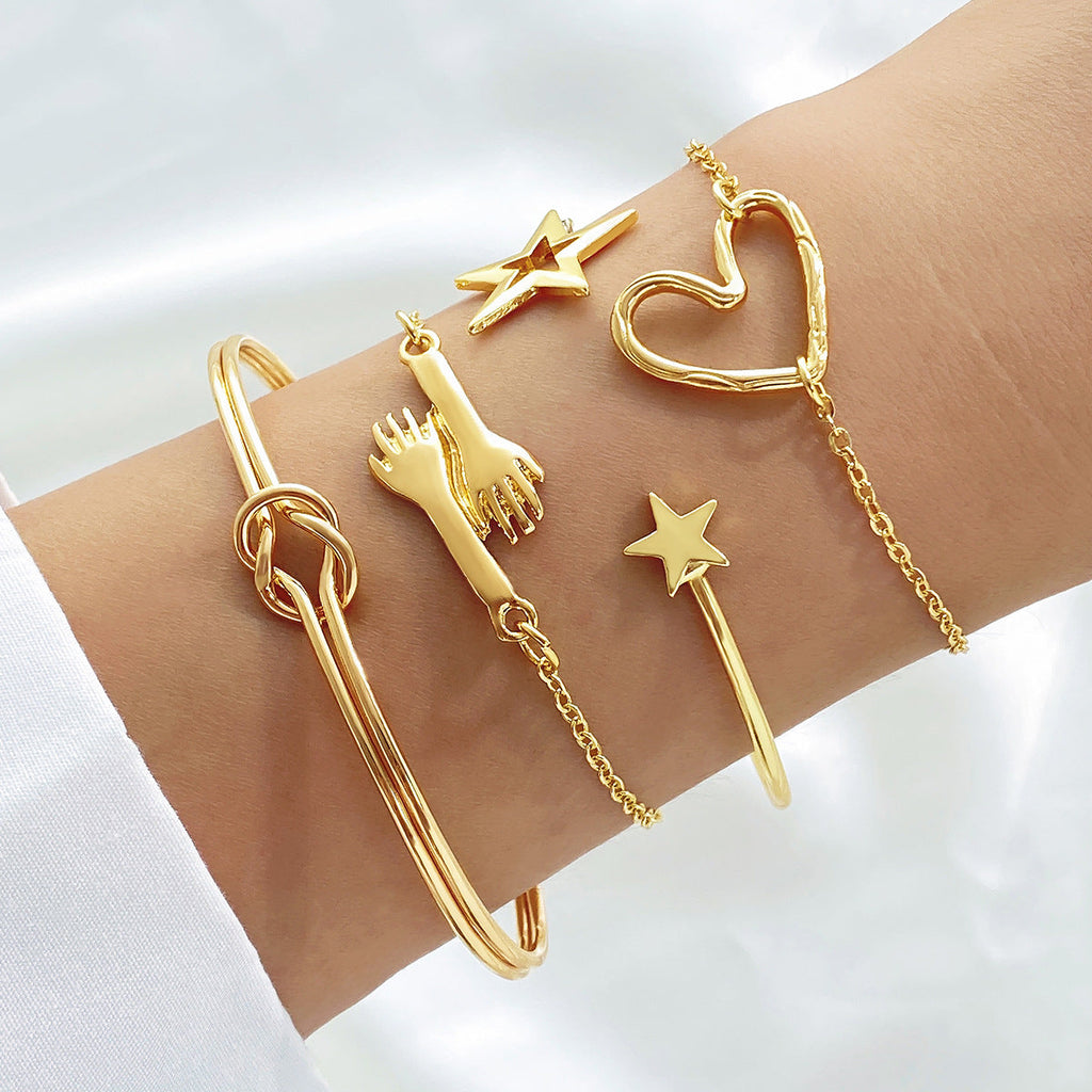 4-Piece Creative Heart Crossed Alloy Bangle Bracelet Set