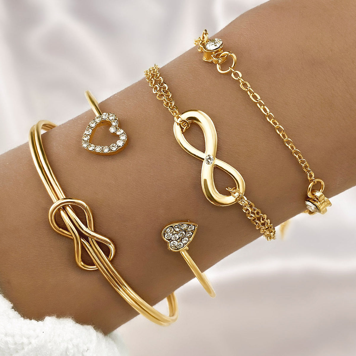 4-Piece Creative Heart Crossed Alloy Bangle Bracelet Set