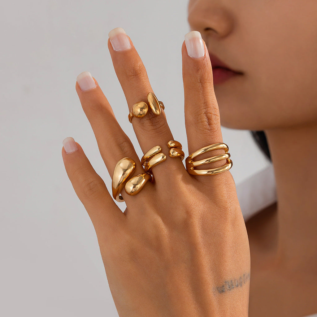 4-Piece Polished Liquid Metal Textured Ring Set