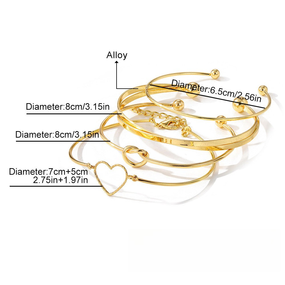 4-Piece Creative Heart Crossed Alloy Bangle Bracelet Set